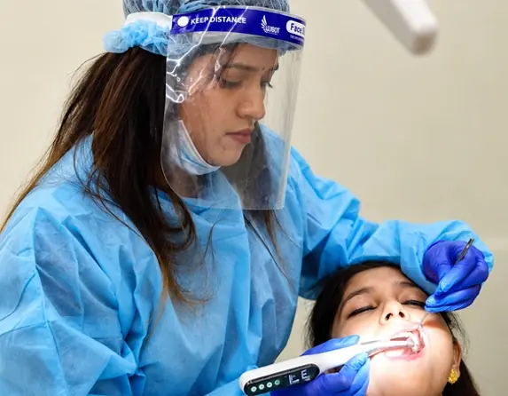 Root canal treatment saving a natural tooth at Radiant 32, Bhowanipore
